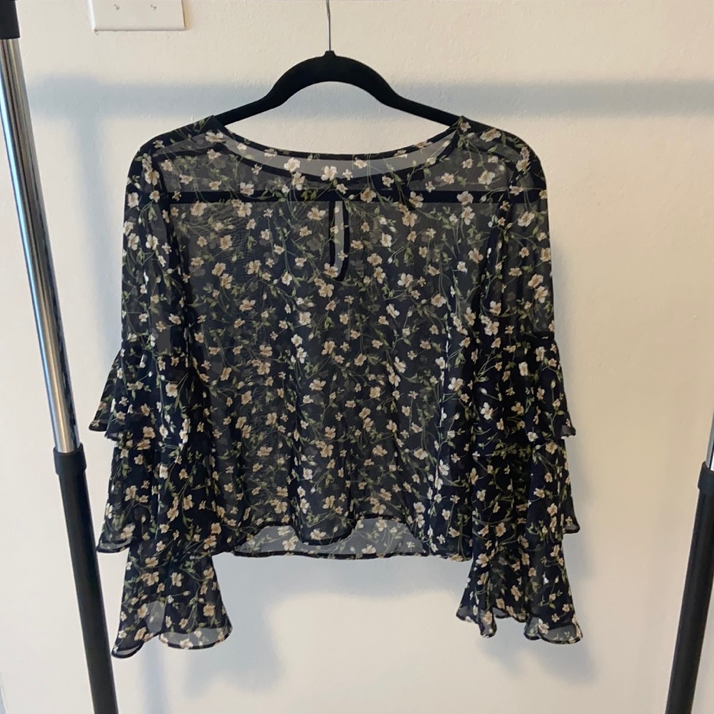 Forever 21, medium, ruffle sleeves flower blouse.